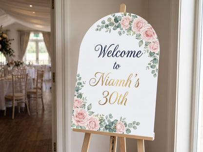 Arched foamex welcome sign on an easel reading Welcome to Niamh's 30th (example design)